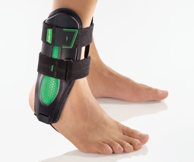 Sprunggelenkorthese Cellacare Malleo Akut Classic schwarz-grün Gr.1>>>>