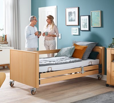 Pflegebett DALI mit Holzhaube u. Kabelhandschalter 90x200 cm Holz>>>>